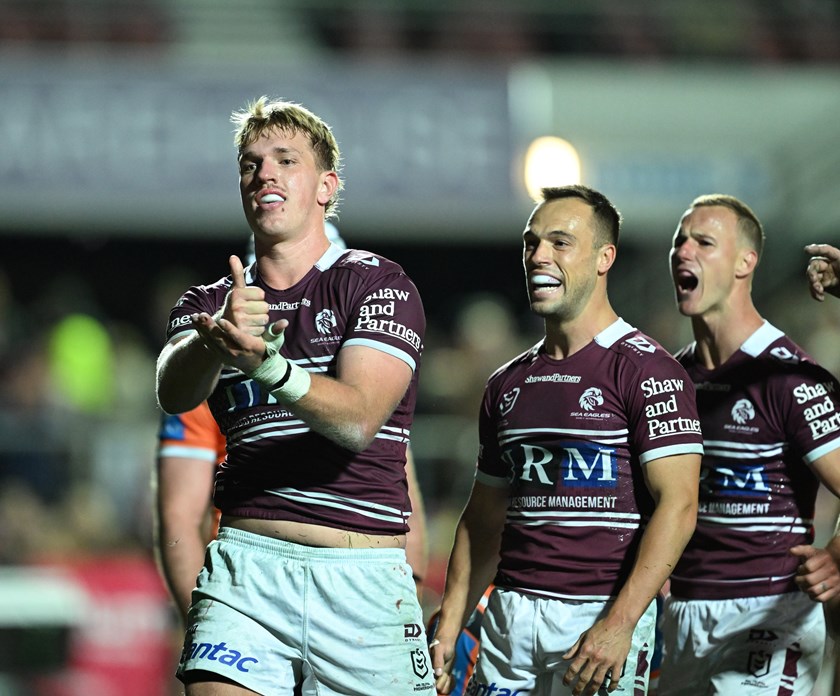 Ben Trbojevic celebrates after scoring a try vs the Tigers in Round 17 at 4 Pines Park