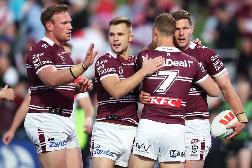 Corey Waddell celebrates on of his two tries against the Dragons in Round 26.