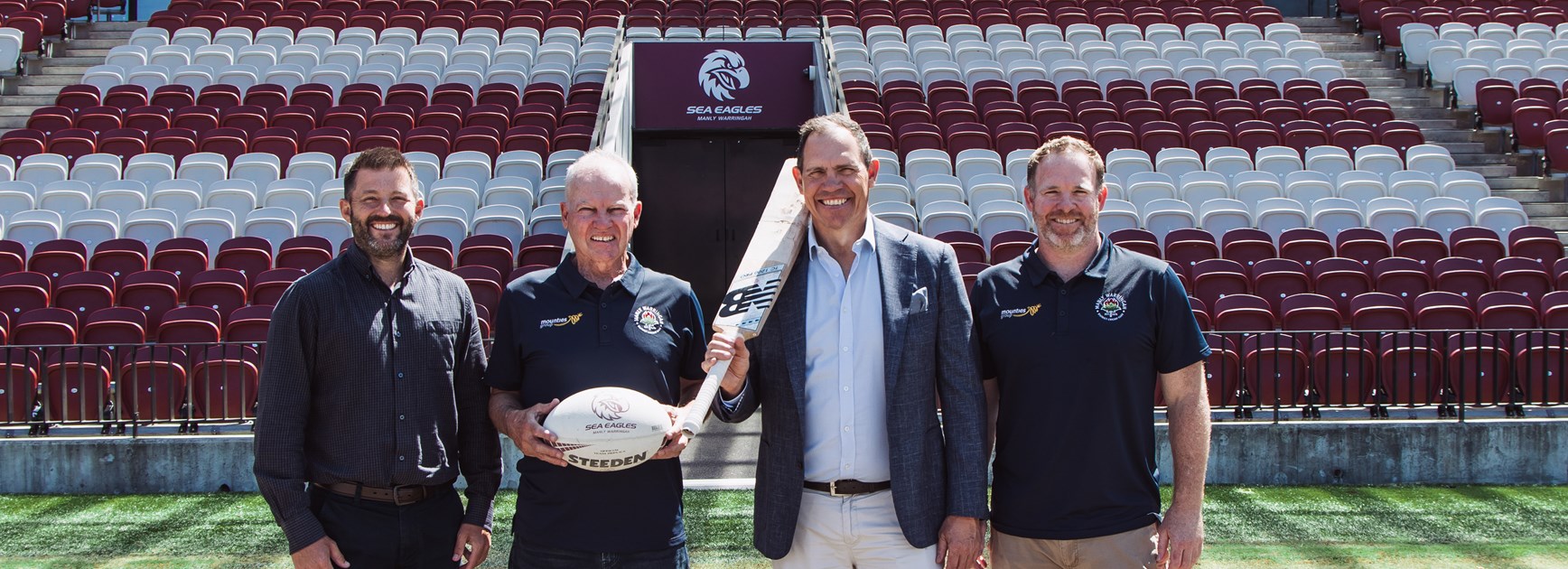 Sea Eagles CEO Tony Mestrov and MWCC President Andrew Fraser flanked by Adam Cosgrove (L) and Joel Mason (R)