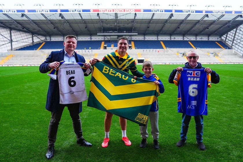 Andrew Foster, Mitchell Moses, Rob Burrow's nephew Myles and Rob's father Geoff at Headingley