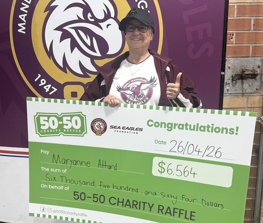 Winners are grinners: Maryanne collects a very big cheque