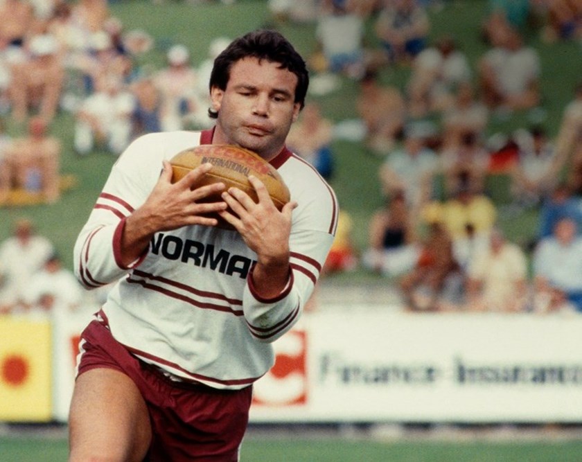 Legendary Manly fullback Graham 'Wombat' Eadie cradling the leather Steeden