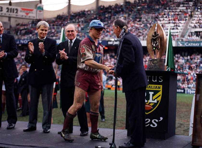 Toovey is presented with the Clive Churchill Medal in 1996 by ARL Chairman, Ken Arthurson
