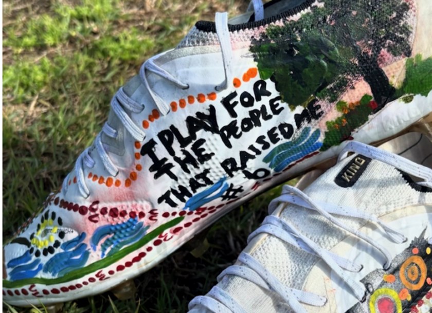 Jamal Fogarty's hand-painted boots for Indigenous Round
