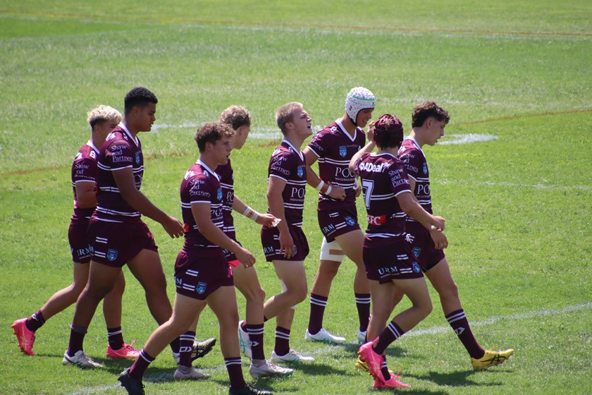 Going well...the Sea Eagles walk back after scoring one of their four tries